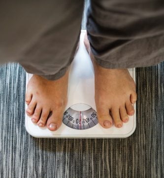 woman standing scale